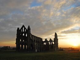 Whitby_Abbey_at_sunset